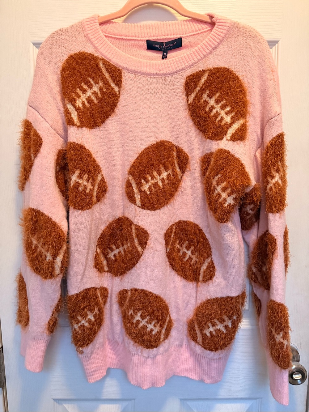 Simply Southern Pink Crewneck Sweater with Brown Fuzzy Footballs
